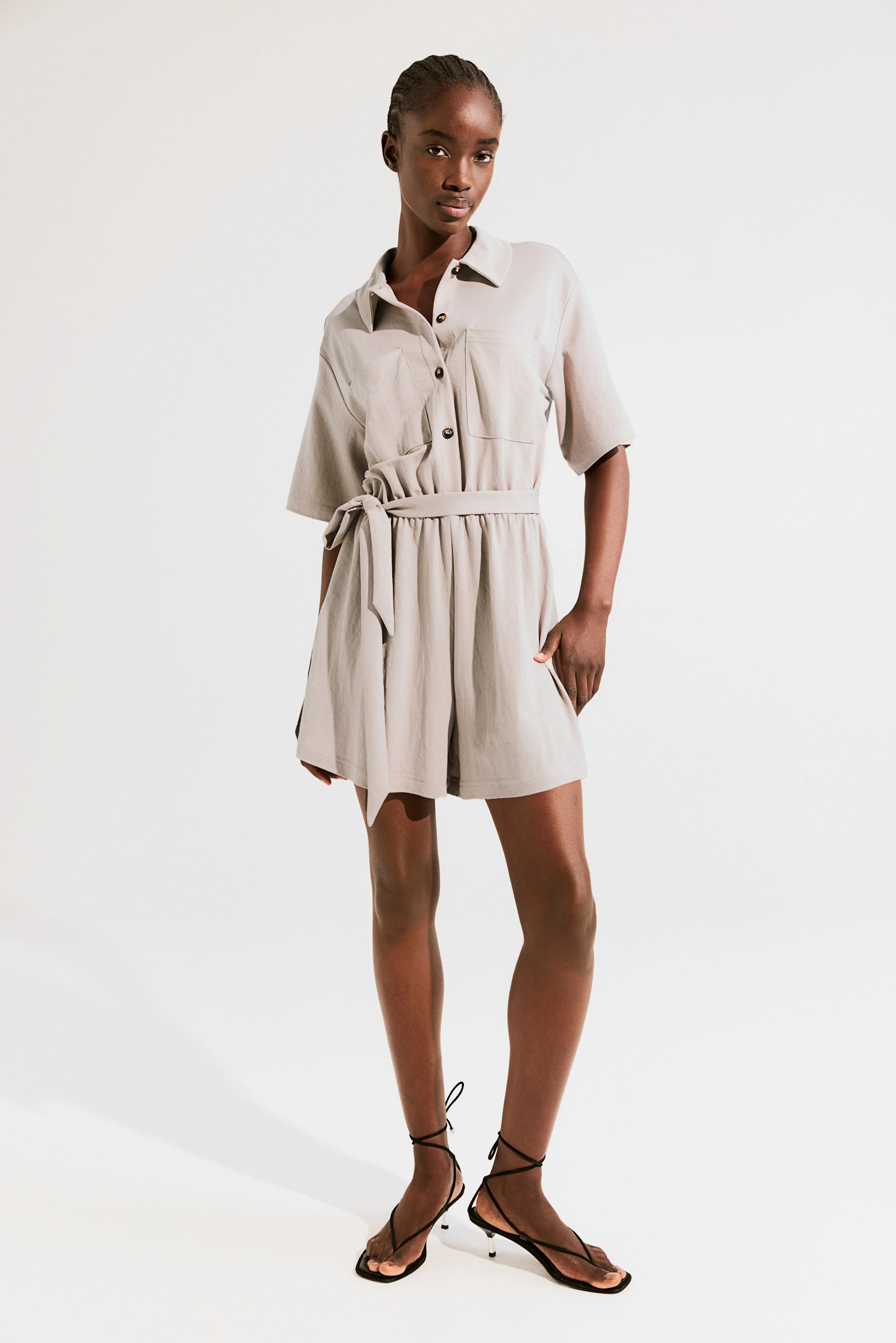 Textured jersey playsuit - Short sleeve - Short - Light beige - Ladies | H&M GB