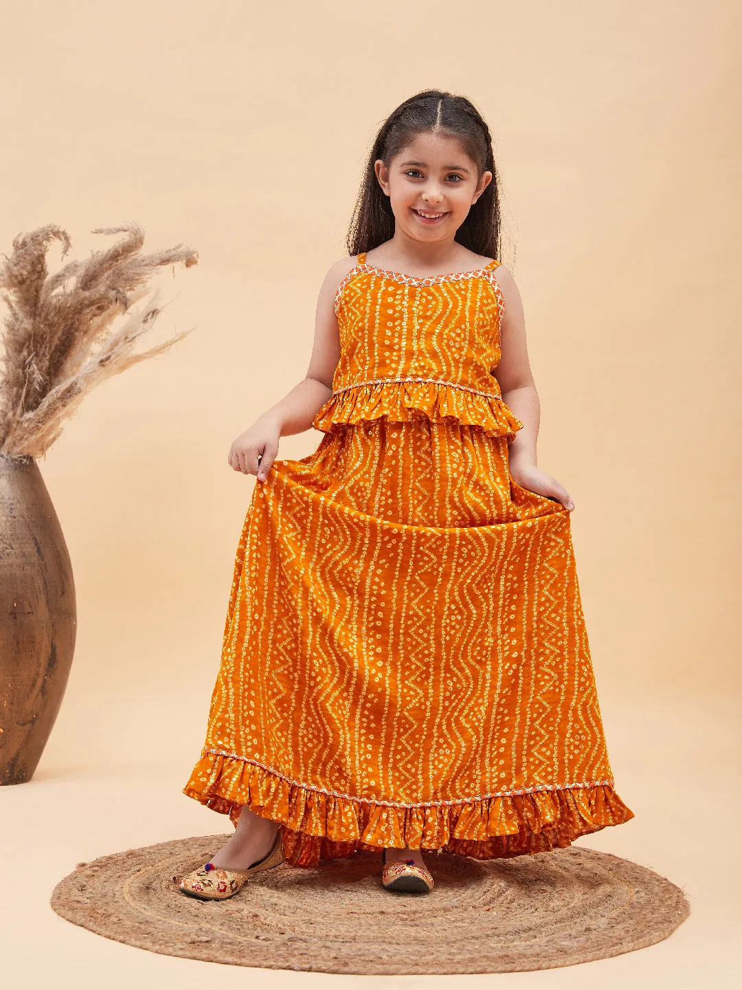 VASTRAMAY Girl's Orange Bandhani Top And Long Skirt Set